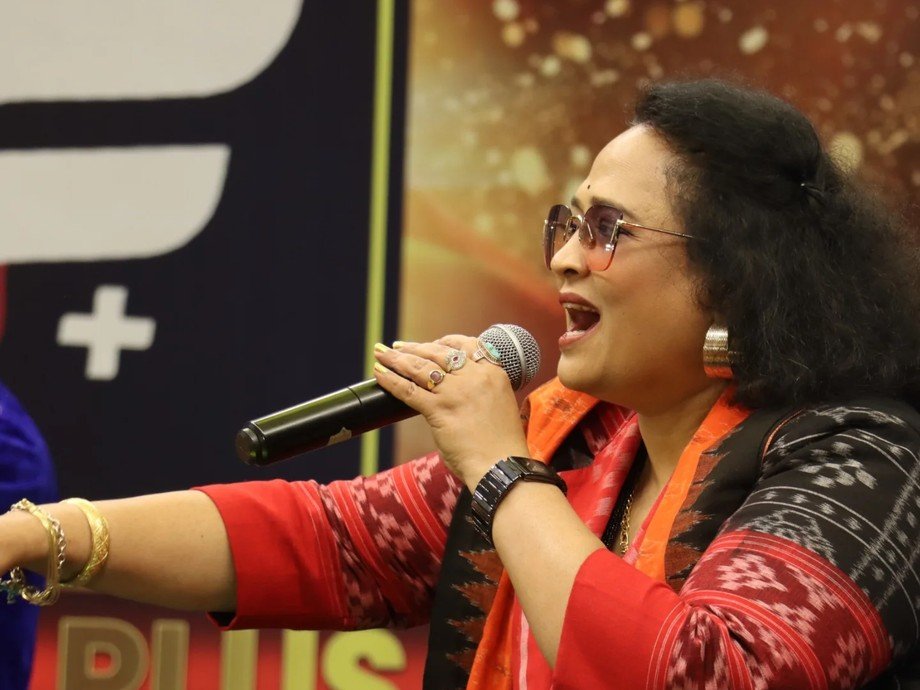 Dr. Jayashree Dhal singing during a live performance